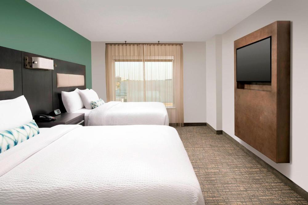 One-Bedroom Suite with Two Queen Beds and Sofa Bed interior